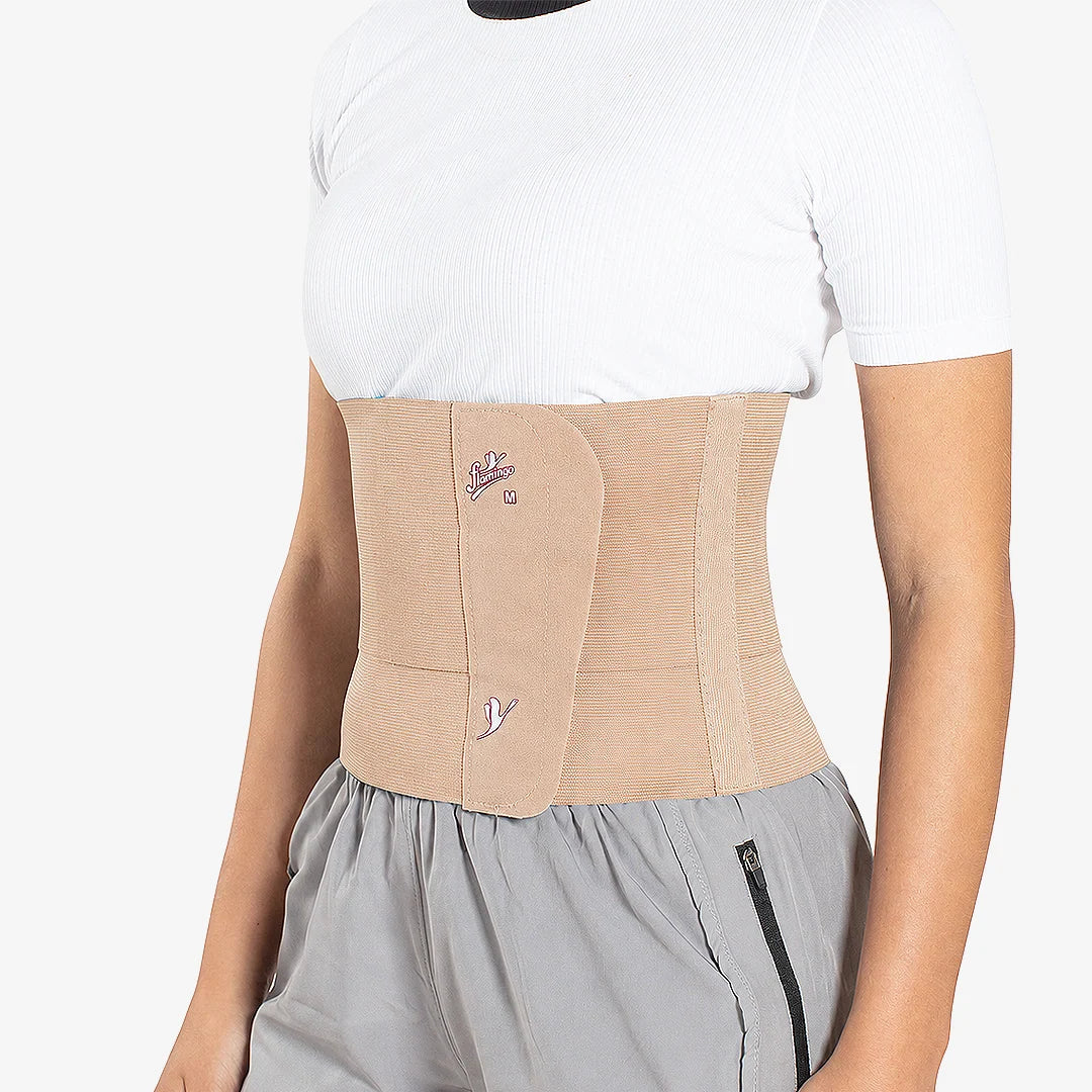 Flamingo 20 cm abdominal support belt worn around the abdomen
