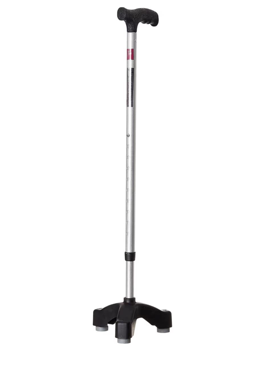 Walking cane with black foot grips on a white background