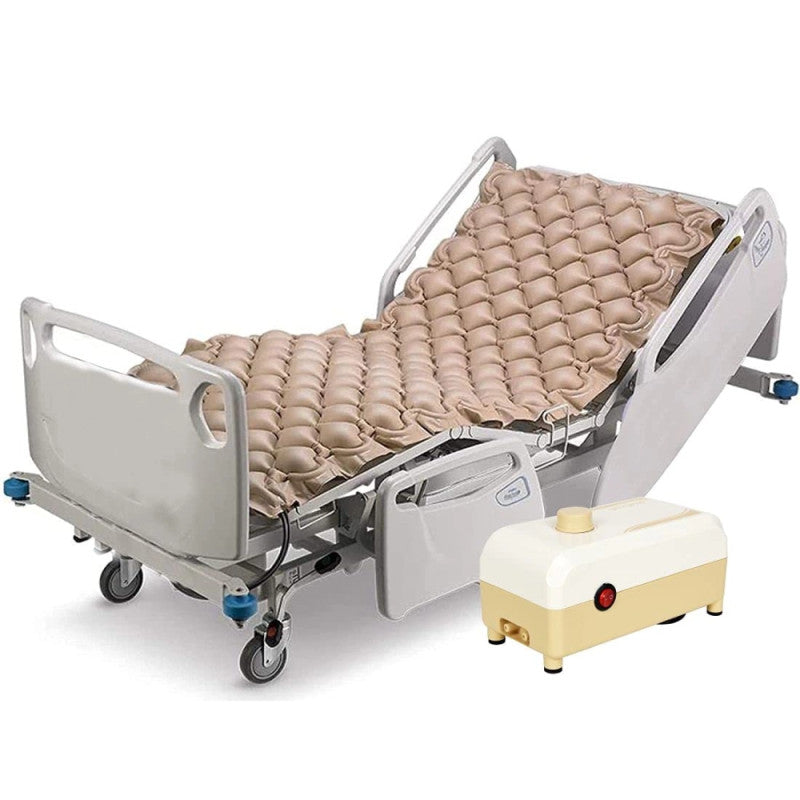 Hospital bed with air mattress and control panel on a white background