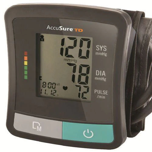 AccuSure TD digital blood pressure monitor showing a blood pressure reading and heart rate on a clear digital display